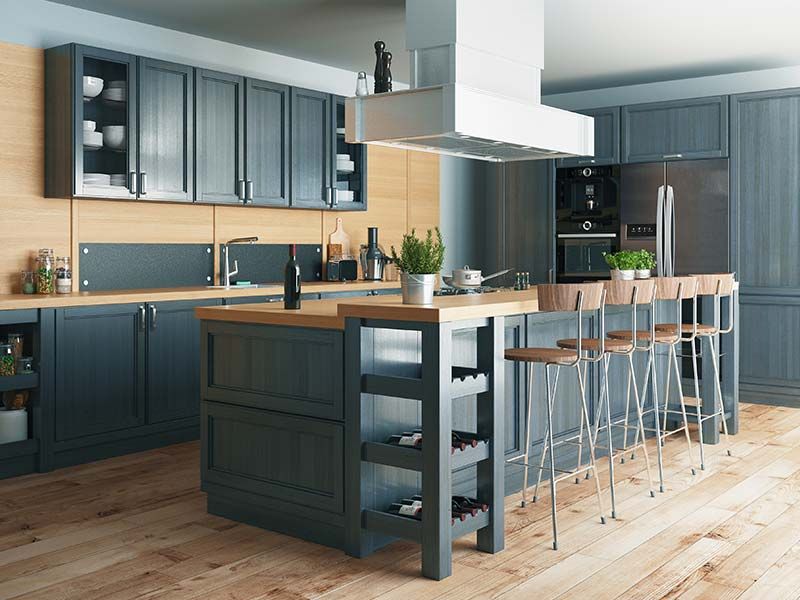 Custom kitchen remodel with navy cabinetry and wood countertops