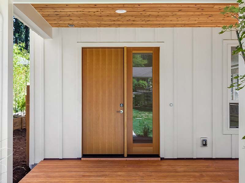 Custom wood front entry door installation